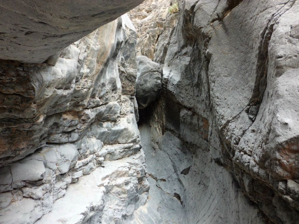 The passable middle canyon came to an abrupt end at this wedged boulder dry fall: