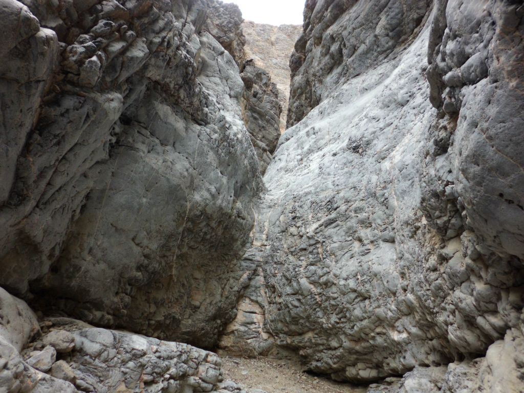 Check this out.  This is a reverse dry fall which appears on the opposite side of where it should in the canyon.  The water must pool up really high and deep here during floods: