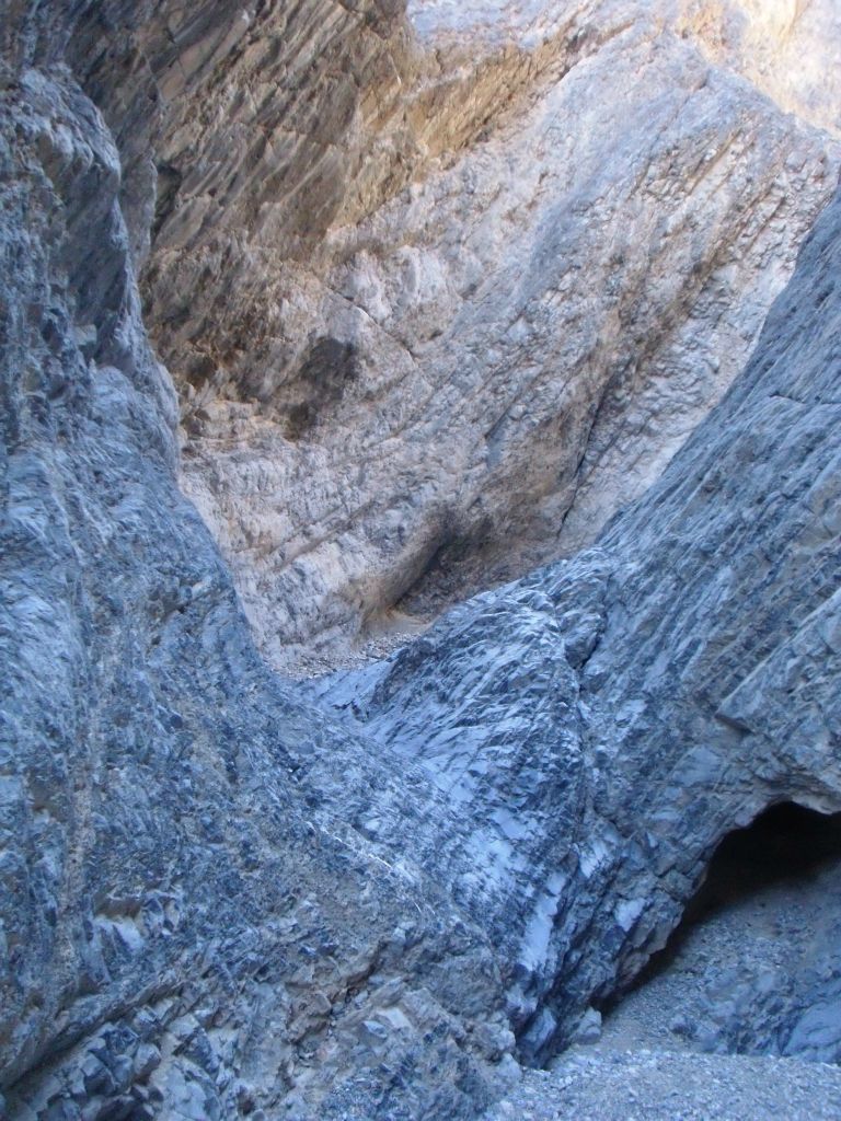 Climbing down a minor dry fall at this very pretty spot in the canyon: