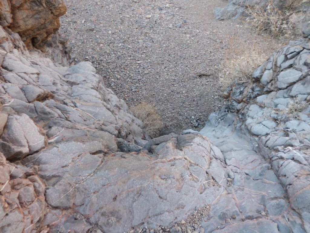After a while, we came to a gorge area with some dry falls.  This was the first dry fall that we had to bypass: