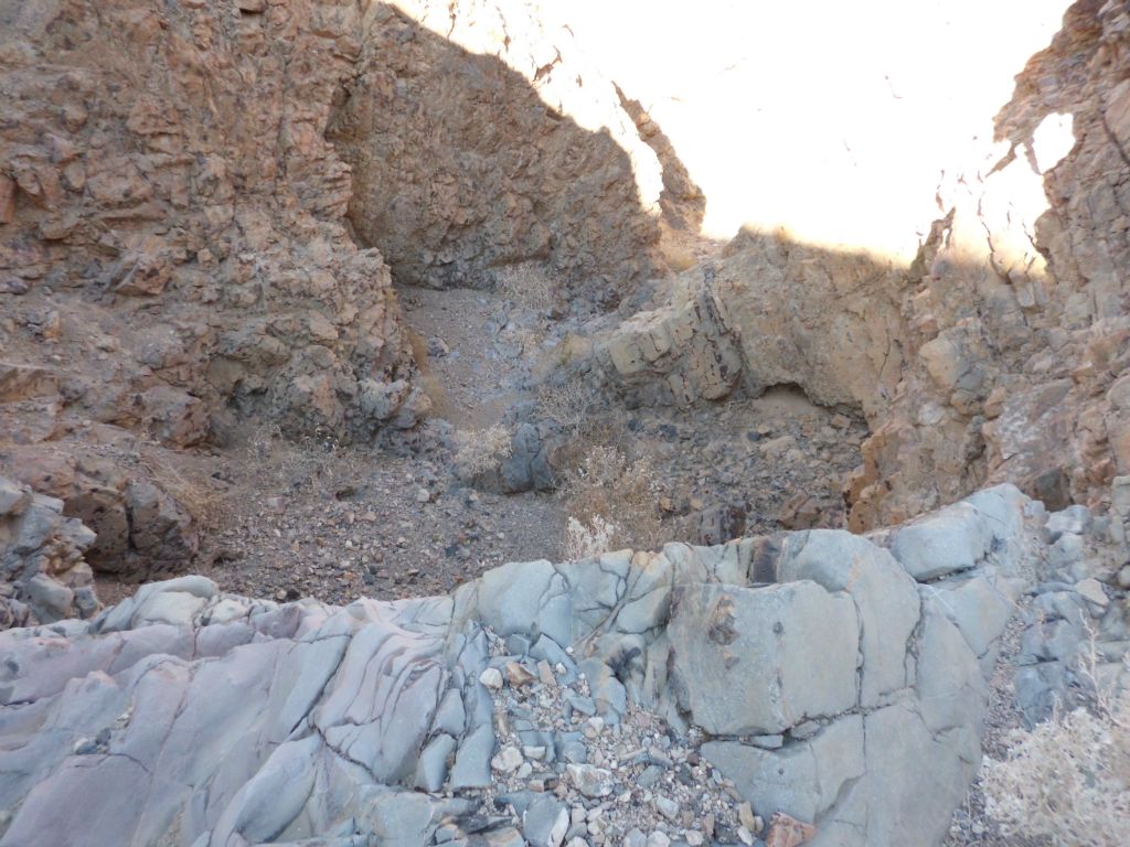But soon we came to the edge of another dry fall that we would have to bypass.  Time to head back up on the ridge: