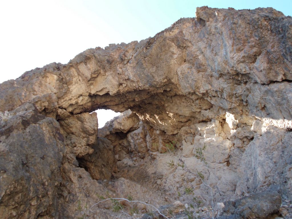 A close-up of the 4th rock arch and the sunlight shining through the rock window: