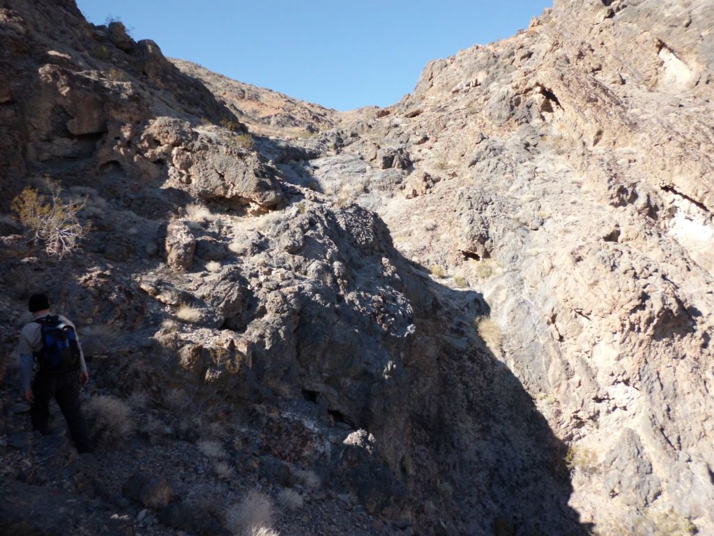 The head of the side canyon and the ridge is near the top of this picture.  We had to bypass some of the steepest parts found here.  You can see Tobin working his way around to the left in this picture: