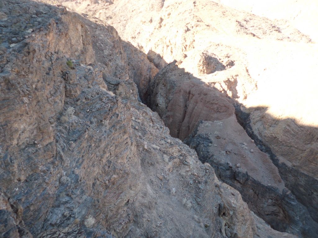Very high and deep slot narrows of Middle Hidden Bridge Canyon and a neighboring side canyon.  We couldn't get into these narrows either: