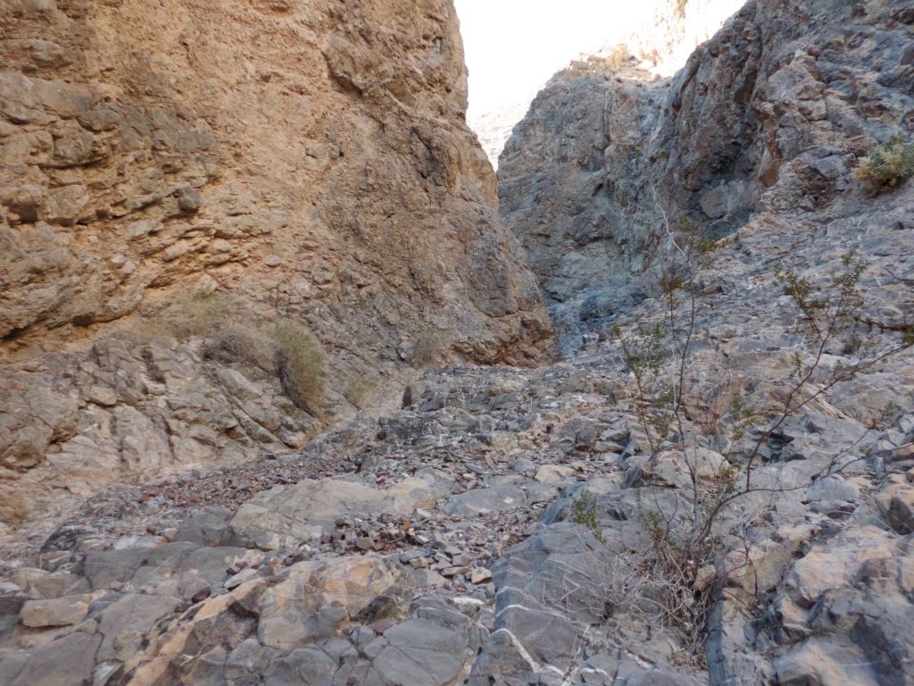 The solid rock covered the floor of the wash at many times: