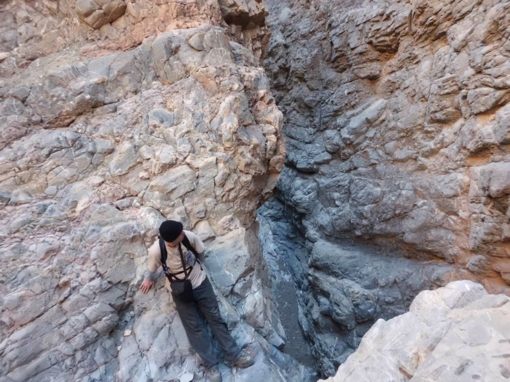 A picture of Tobin at the top of the 30 foot dry fall.  With daylight hours starting to wind down, we had to turn around and head into the upper canyon.  But there was still more to see: