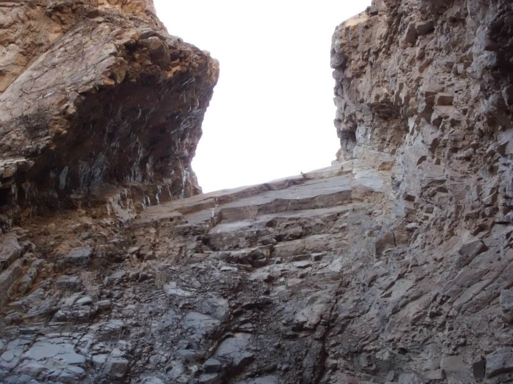 Zooming in on the polished surface of the top of the dry fall: