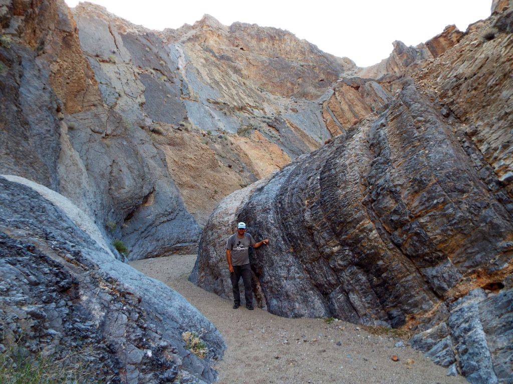 Getting a picture in this wonderland of rocks all around.  Note the great number of colorful rock walls and rock slabs everywhere: