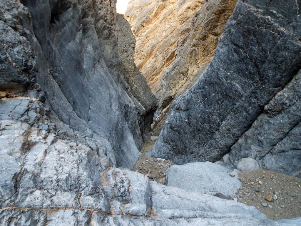 Amazing contrast between the background rock and the two canyon walls of the slot passage: