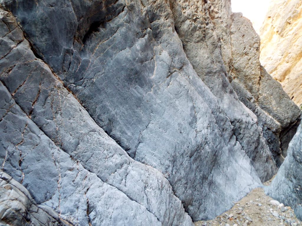 Beautiful smooth, polished blue rock on the left side canyon wall:
