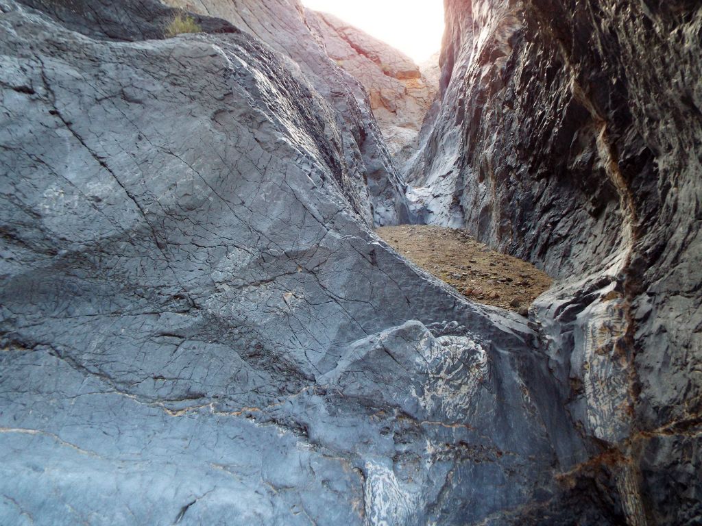 A couple of minor polished dry falls with smooth blue rock all around: