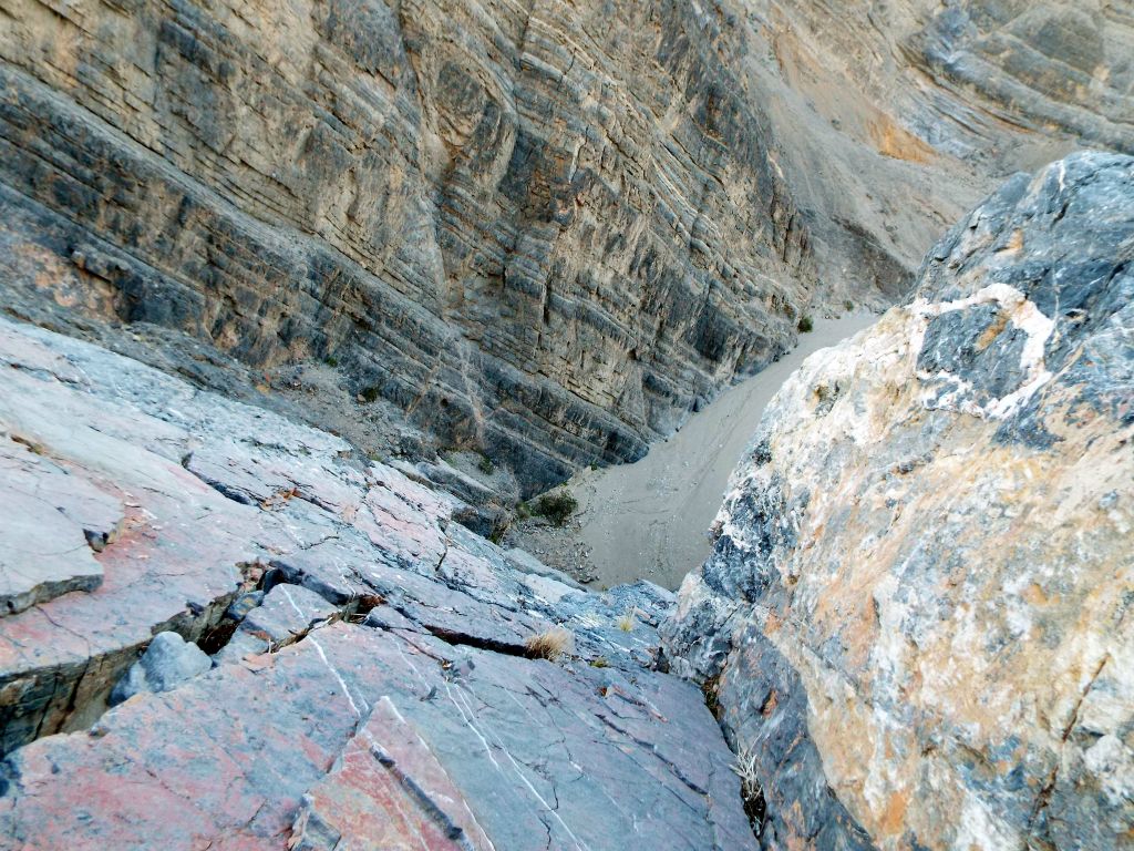 My favorite view was looking straight down toward the wash far below with colorful rock all around: