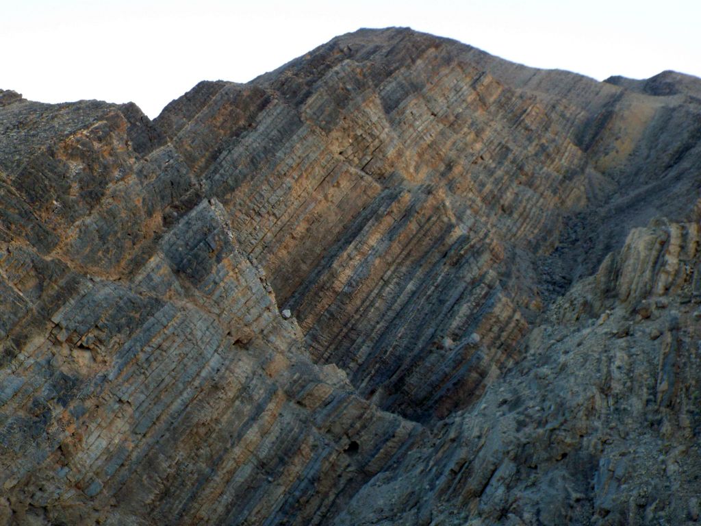 Gorgeous striped peaks rising above Pothole Canyon which are only visible by climbing the hillside: