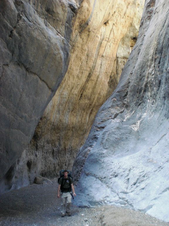 The towering Marble walls appear to tilt over at an angle in this picture of Brandon passing through them: