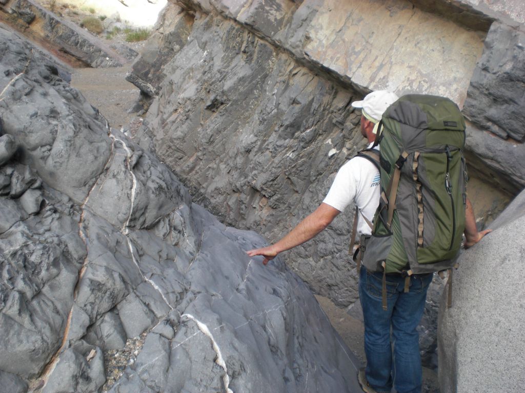 Shawn stopping at the chockstone blocking entrance into the 1st Narrows.  Shawn is basically a professional backpacker who is currently working on completing the Pacific Crest Trail, so we were grateful that he took some time out to backpack with us in Death Valley: