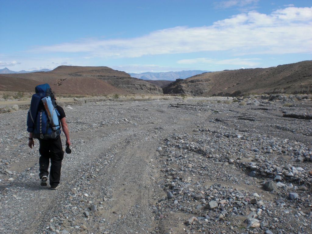 In our final photo, Conrad is backpacking down the Marble Canyon wash toward our vehicle and the end of this backpacking trip:
