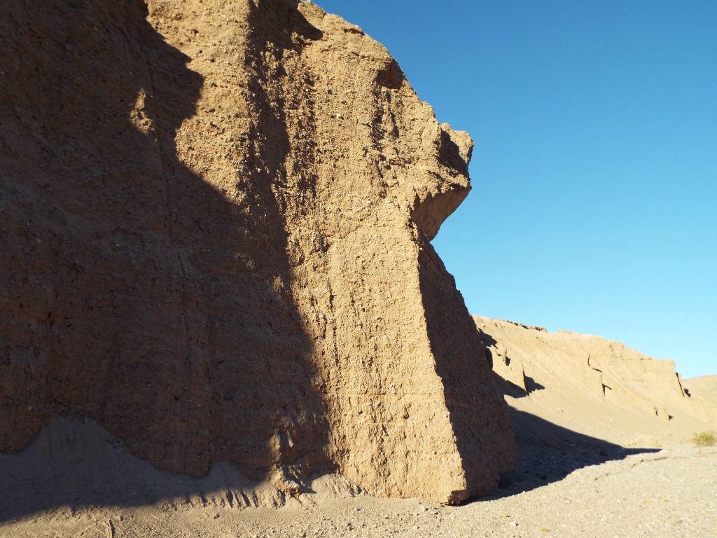 Notice the odd triangular shape high up the canyon wall: