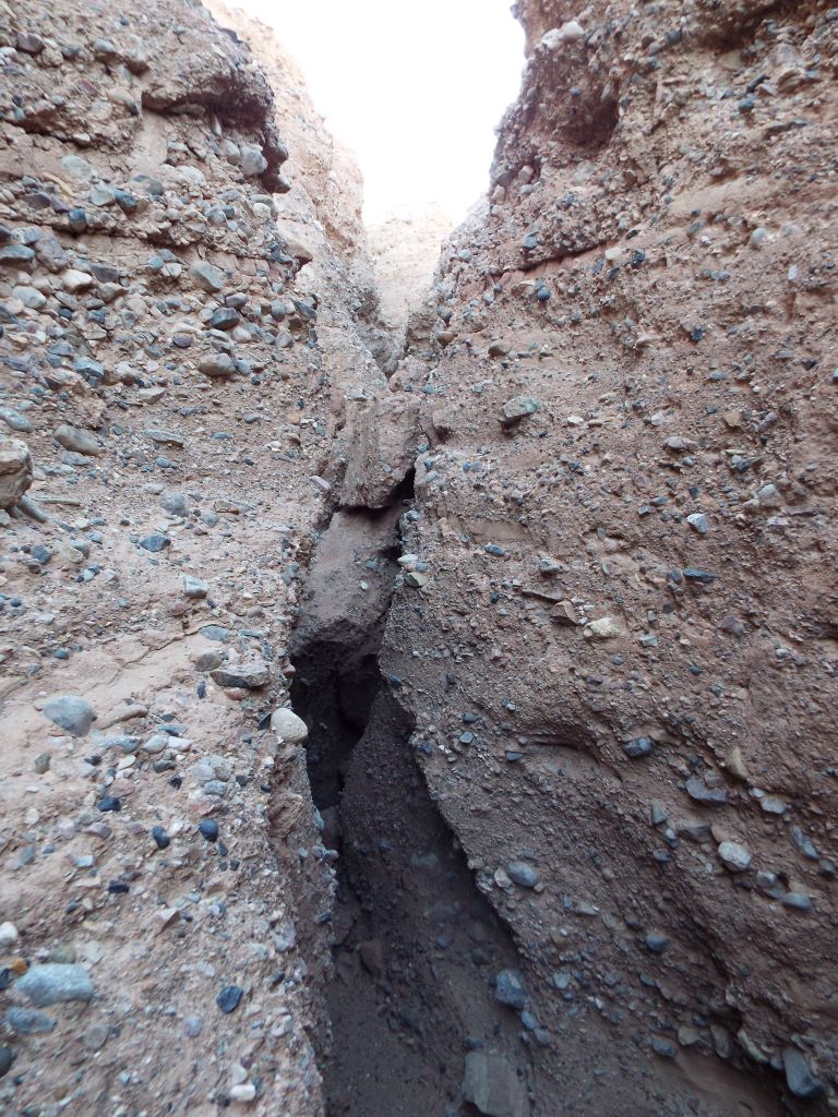 Up ahead, a couple of boulders have fallen into the canyon and gotten wedged right in the middle of the passageway: