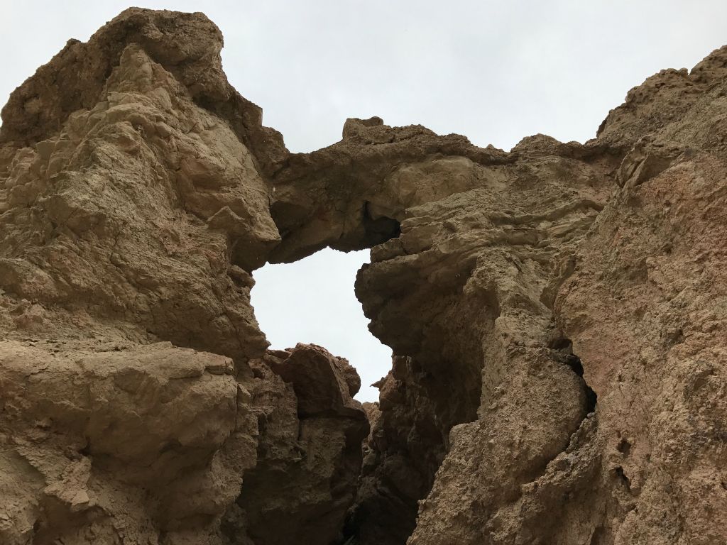 Looking up at Crown Bridge, it is clearly a delicate formation.  Please do not attempt to scramble up the hillside and walk on top of it, which could cause collapse and serious injury: