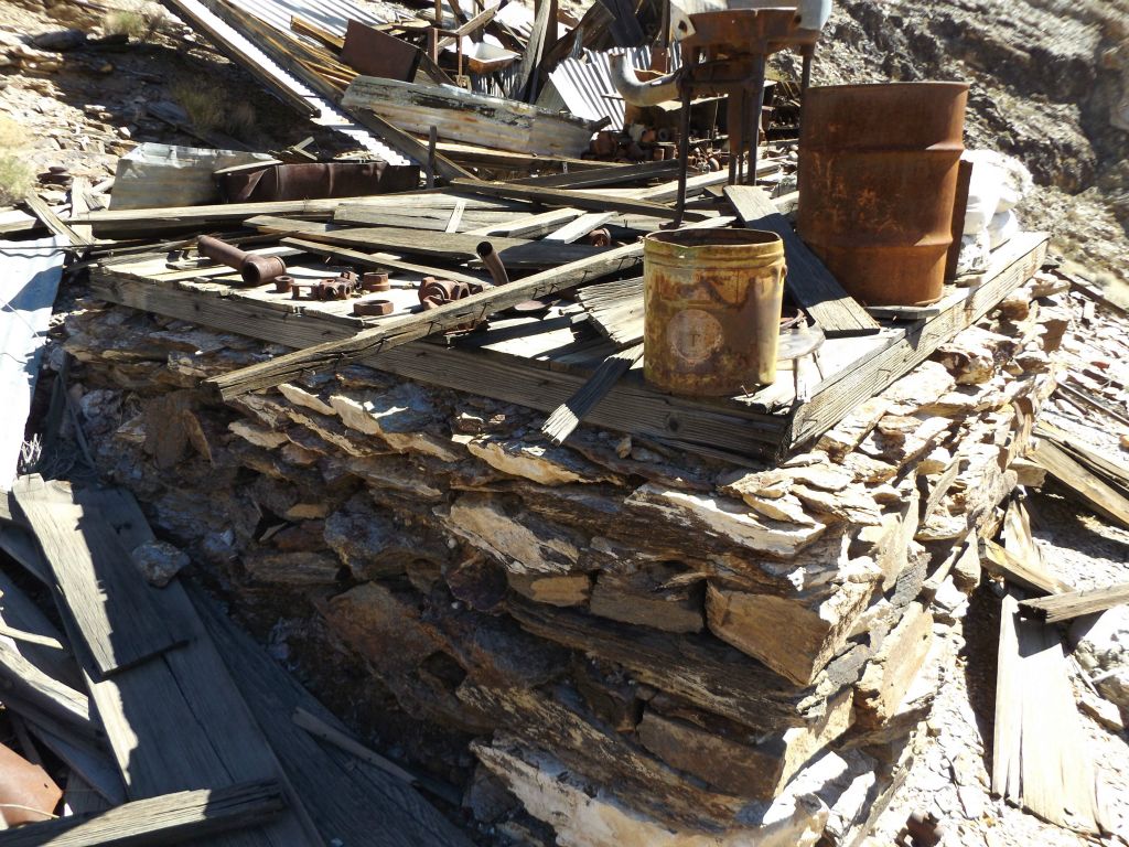 The remains of a couple workshops can be found along with assorted parts: