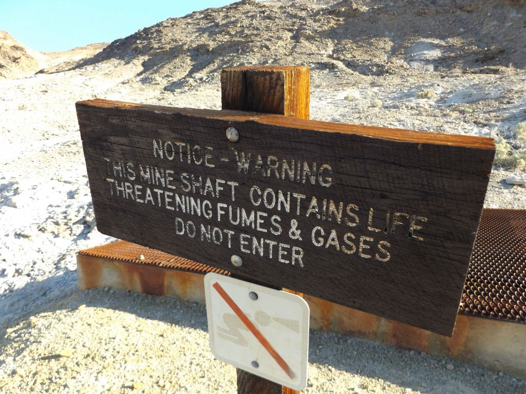 A warning notice which should be heeded to avoid breathing in toxic hydrogen sulfide: