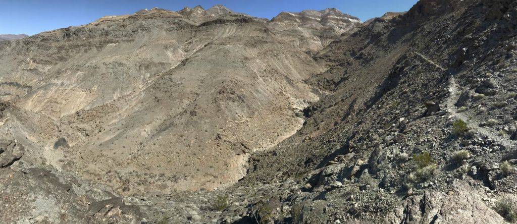 Panoramic from the same spot looking up canyon and at the trail as it continues on: