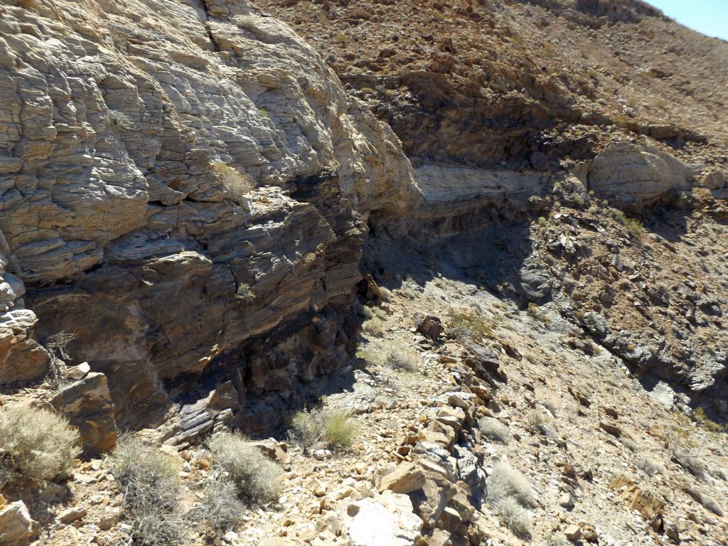 However, upon reaching the headwall, the well-constructed trail turns left and climbs above it: