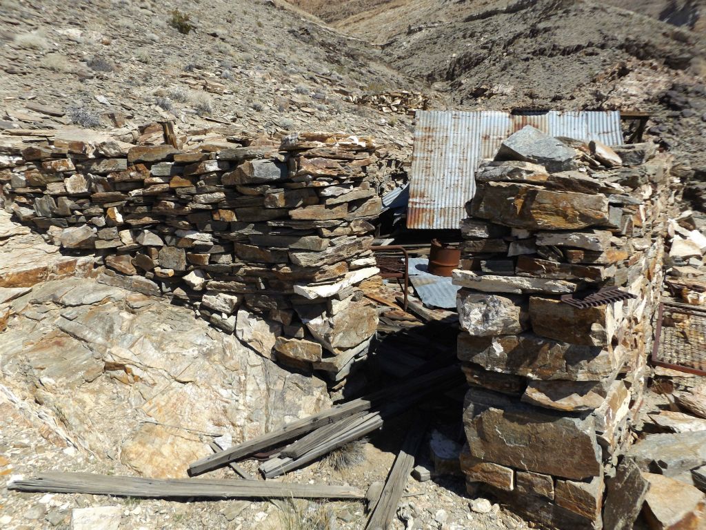 The next two shacks were protected by this rock wind break which was built by miners: