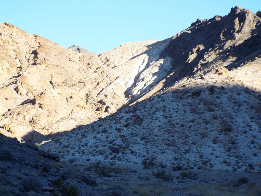 This is the view from the gap looking at the frontside route to attain the 1st saddle.  We didn't climb up this route.  Instead, we continued circling around to the back of the mountain: