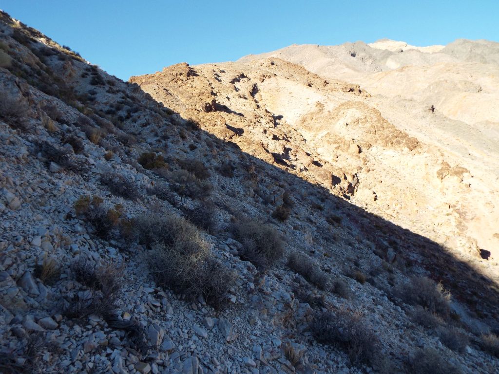 You can see the loose quartz everywhere in this photo.  After climbing very slowly up for a while, we began circling around the side of the hill: