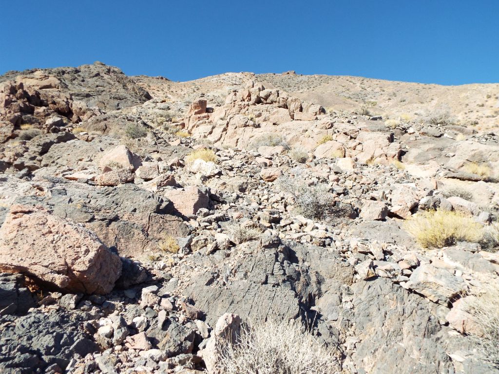 The terrain through here is very rugged and unforgiving.  Many of the solid rock sections are sharp to the touch and can cut you easily: