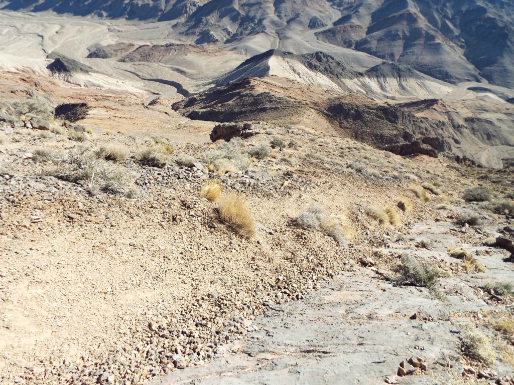 Looking down, notice how I have been hiking on solid rock for a long ways which is directly next to a shale pathway on the left: