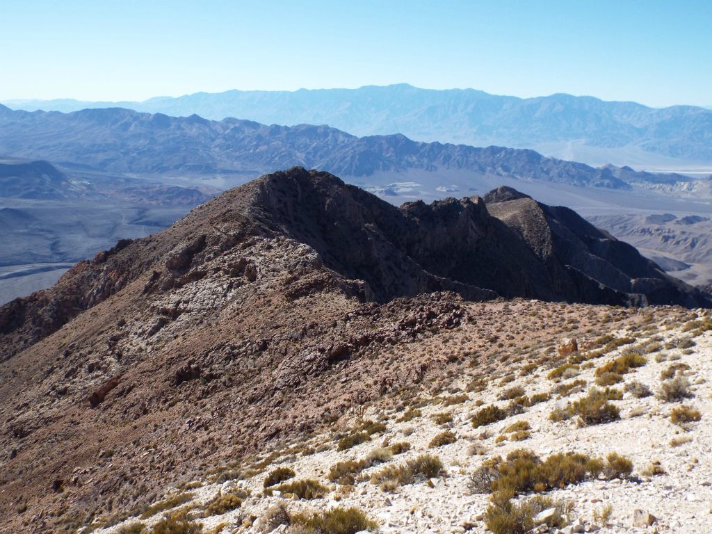 This view to the west from the summit shows the climbers' western ridge route:
