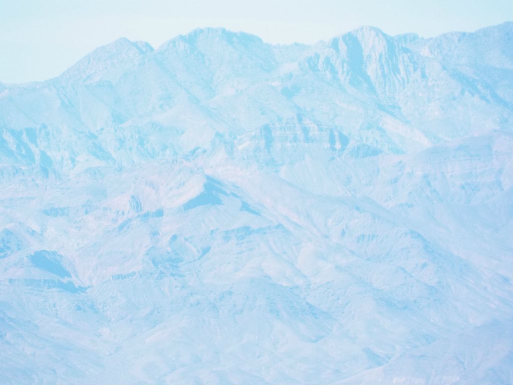 I didn't think it was possible to make Thimble Peak look small, but check out this shot of Mount Palmer (right side) towering over Thimble Peak (just below it to the left slightly) as seen from Pyramid Peak:
