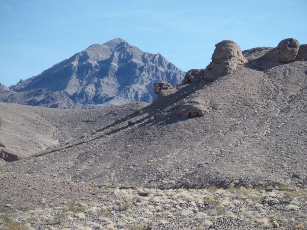 Interesting formations with a very dramatic view of Pyramid Peak in the distance: