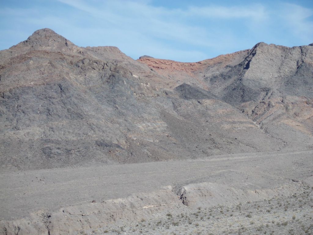 A closer look at that flat red topped ridge in the distance: