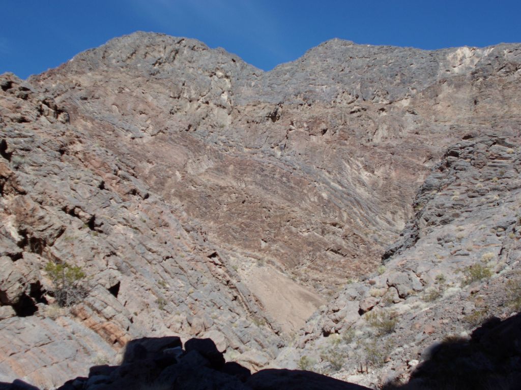 A majestic peak above the wash of Red Amp Canyon: