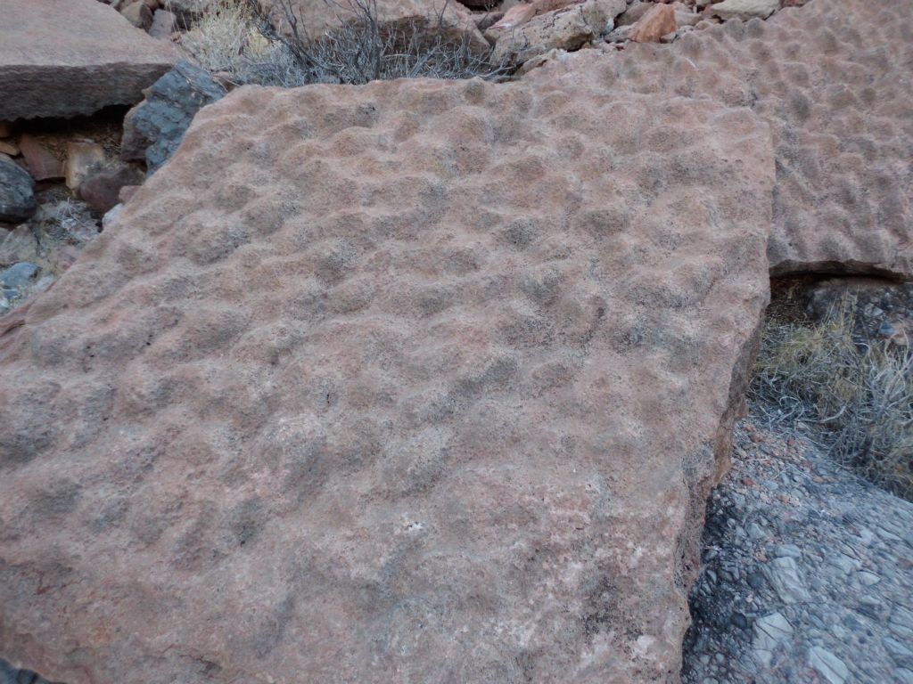 Two pictures of some interesting rocks with bubble like shapes found on the surface: