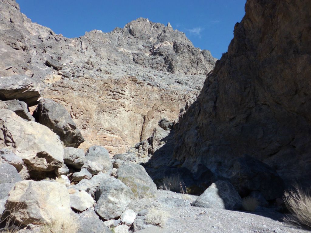 Reminiscent of the early canyon with rockfall, narrows, and towering peaks: