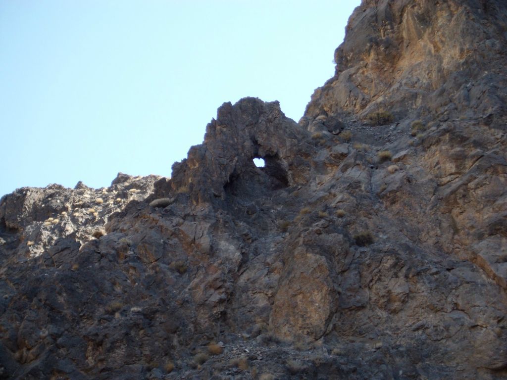 The first of several rock arches that we found in Rockfall Canyon: