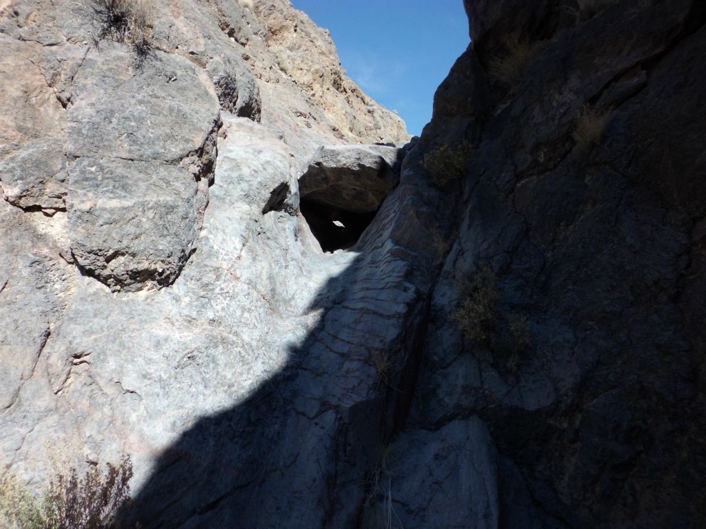 A less difficult dry fall must be climbed just past the major obstacle: