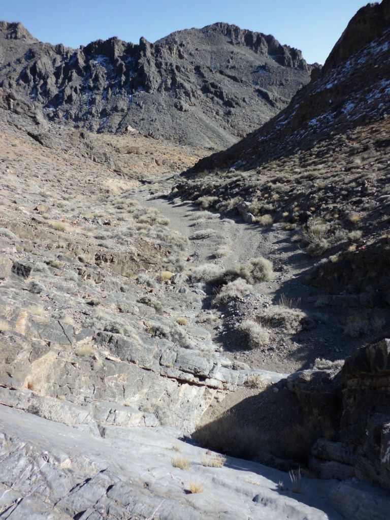 We then dropped over the other side and began descending upper Slit Canyon.  The most difficult obstacle was this dry fall we had to work around:
