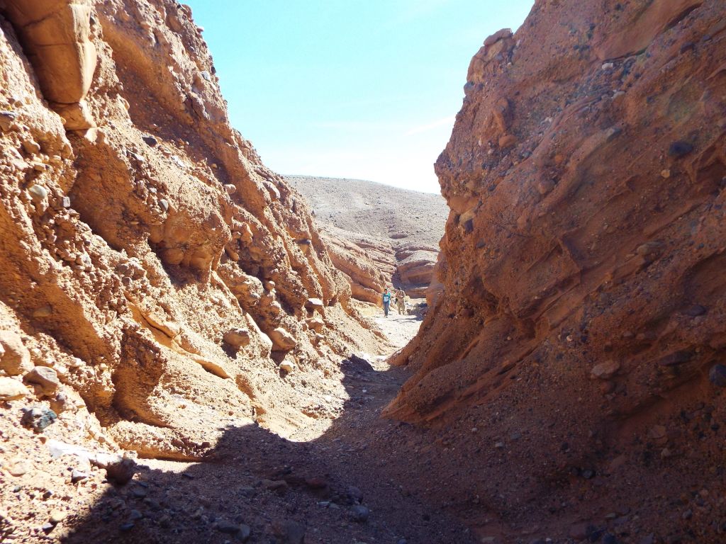 After the 2nd Narrows, there is another junction.  For the most part, the junctions within The Crack are easy to follow as the main wash is fairly obvious.  In the distance, you can see Tobin and Devon catching up to us after passing a junction: