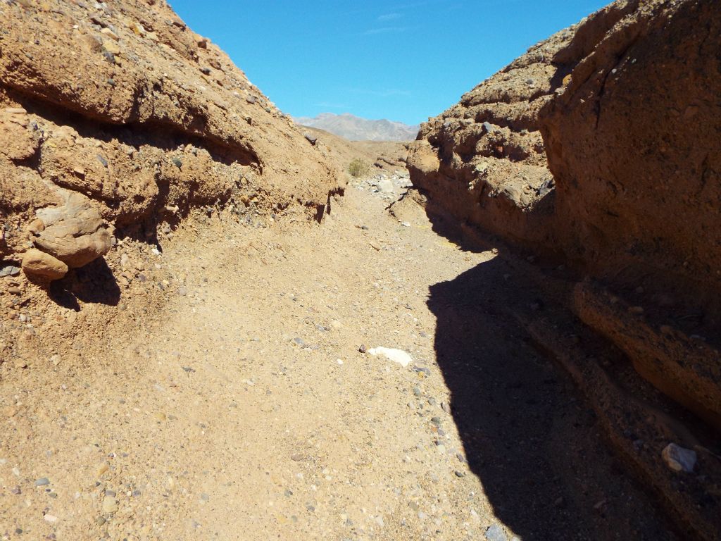 Beyond, the canyon remained narrow but didn't have the same height or straight vertical walls: