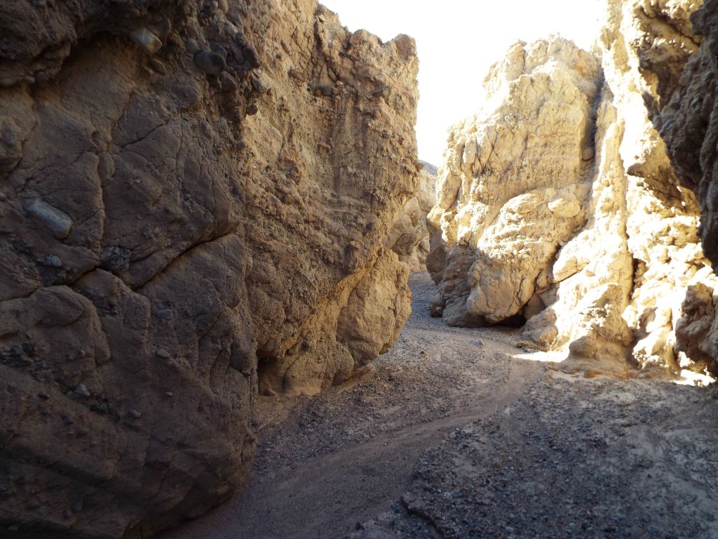Seeing that we were in more narrows, we headed down canyon (toward where we had earlier turned off into the tight slot fork):
