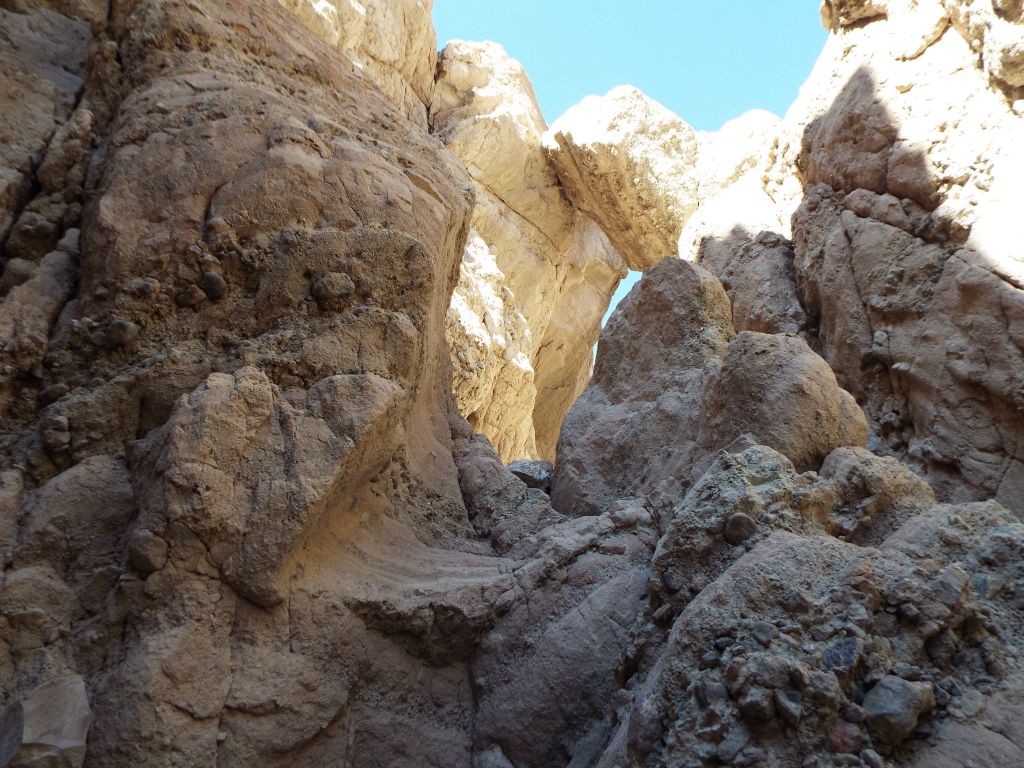 Just past the false bridge is a dry fall which is a little too challenging to climb.  Another wedged boulder can be spotted up canyon: