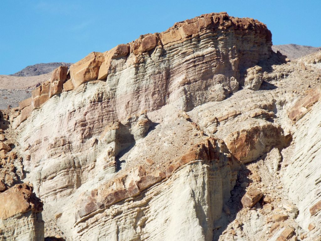 The weathering and erosional process to form these eroded cliffs is quite amazing.  In Bryce Canyon, the primary weathering force is frost wedging.  In Death Valley, it is wind and rain: