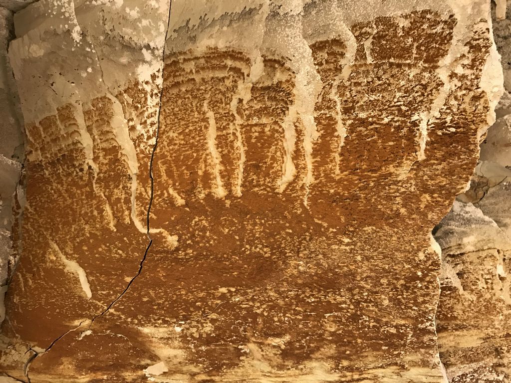 These natural colors and designs on the bridge wall are quite colorful and unique: