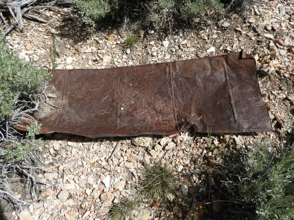 A large metal sheet that was found in a small mining camp area that I stumbled across: