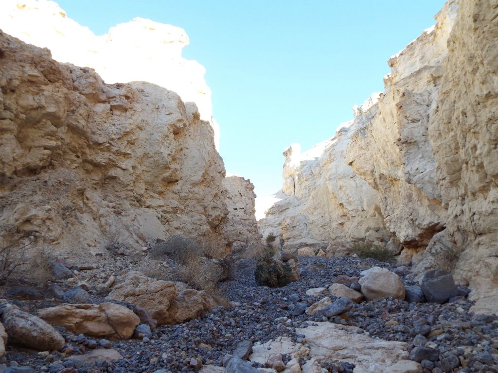 The canyon then opens up just enough to appreciate the height of the cliffs once again: